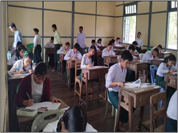 မွန်ပြည်နယ်၊ သထုံခရိုင်၊ ပေါင်မြို့၊ အခြေခံပညာအထက်တန်းကျောင်း(ပေါင်)၌ ကျောင်းသား/ ကျောင်းသူများ အတန်းတင်စာမေးပွဲ ဖြေဆိုနေမှုအခြေအနေအား ကြည့်ရှုစစ်ဆေး 